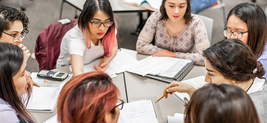  South Seattle College students study in the library 