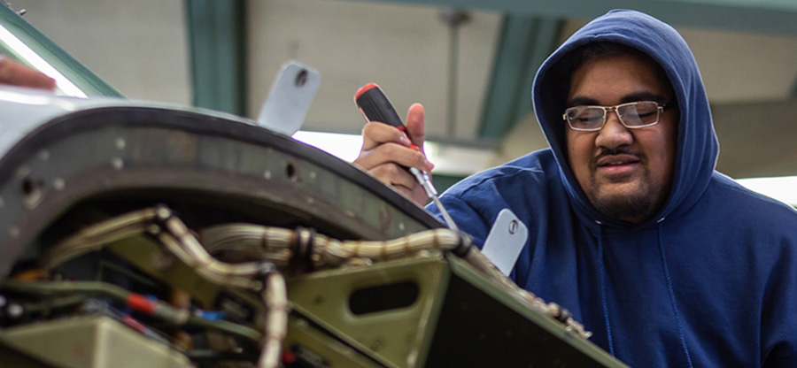 South Seattle College student working in mechanical apprenticeship class