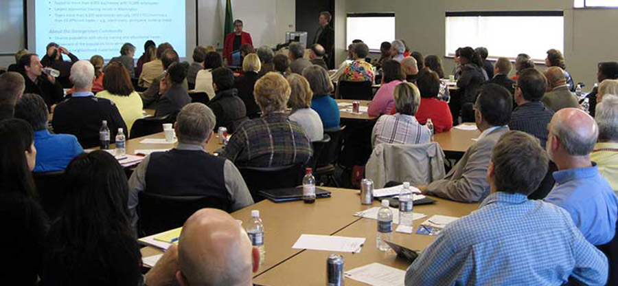 Group of people attending a presentation