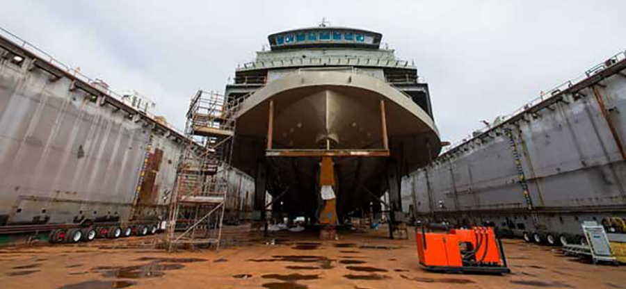 ship in drydock being repaired