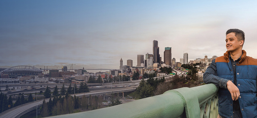  Seattle Colleges student looking out over the city skyline 