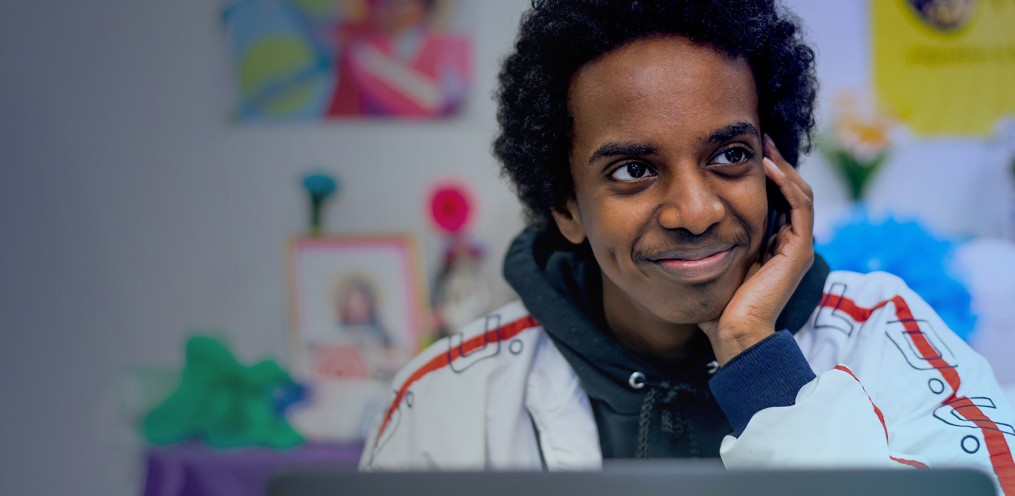  North Seattle College student working in student lounge 