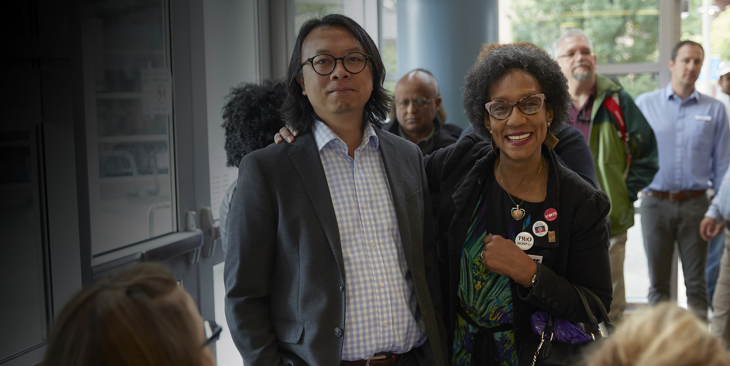  people walking side by side attending a Seattle Colleges event 