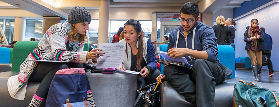  North Seattle College students working together in open study area 