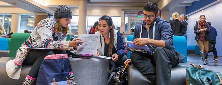 North Seattle College students working together in open study area