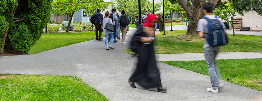  South Seattle College students walking on the lawn 