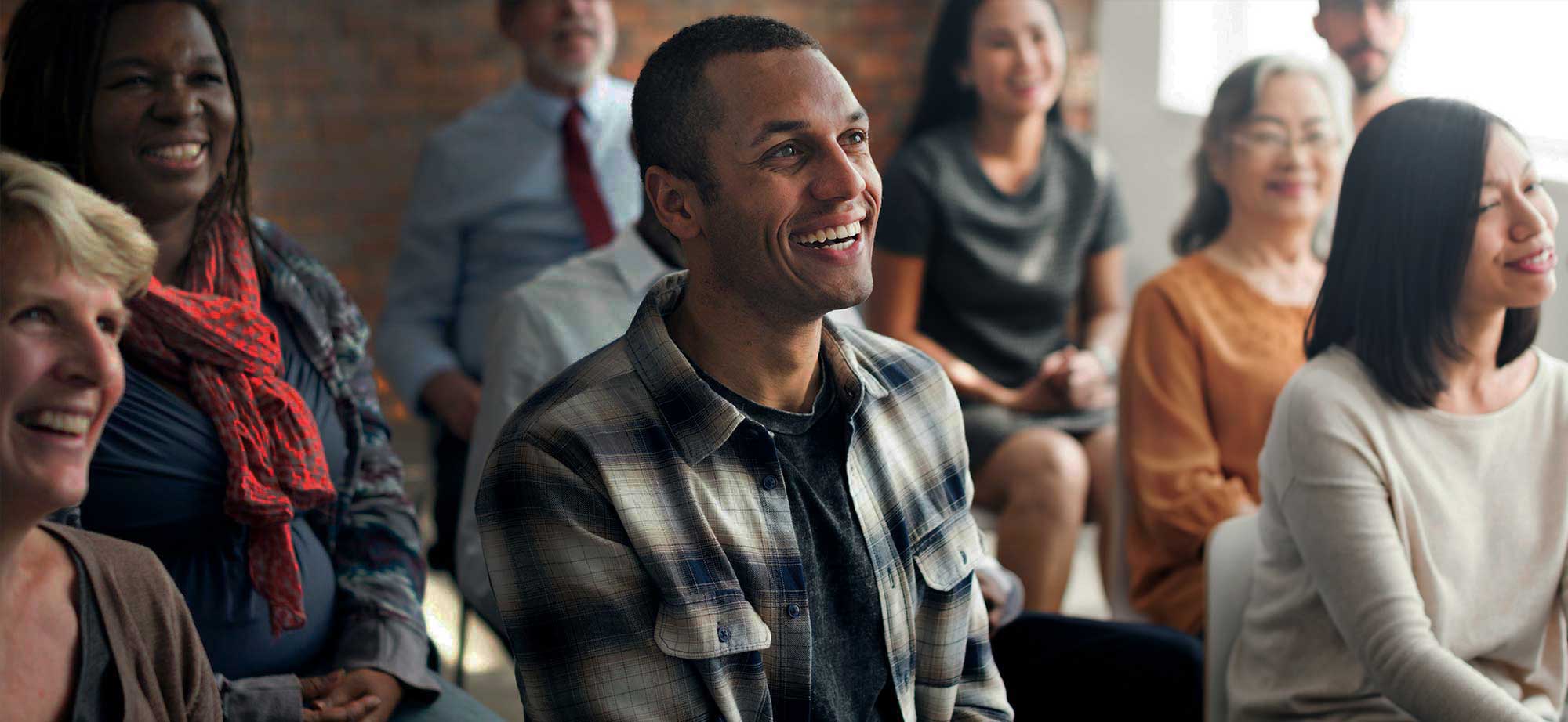  Group of people attending a presentation 