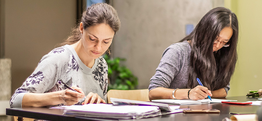  North Seattle College students writing in class 