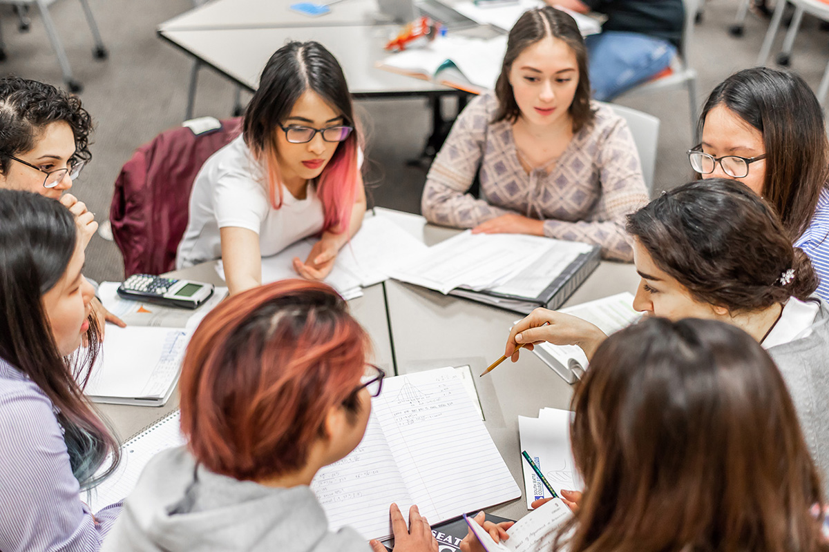  South Seattle College students working together with tutor 