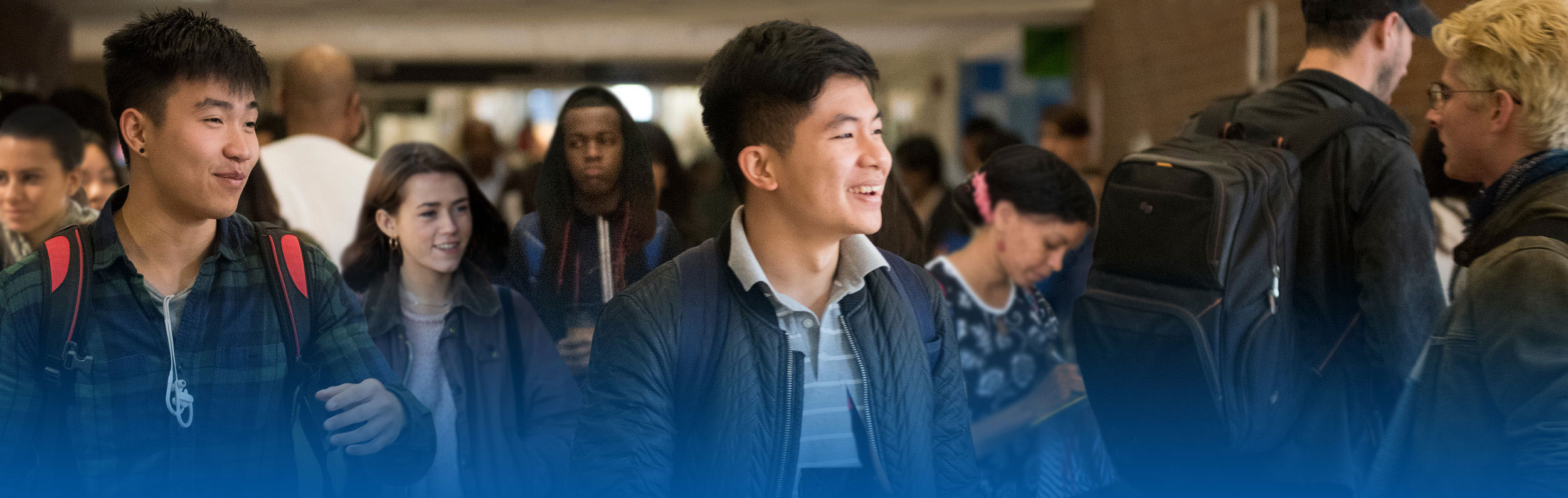 Seattle Central students walking in hall