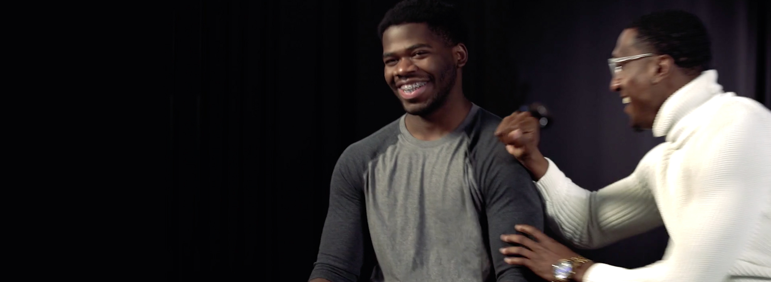  Student mentee and mentor smiling 