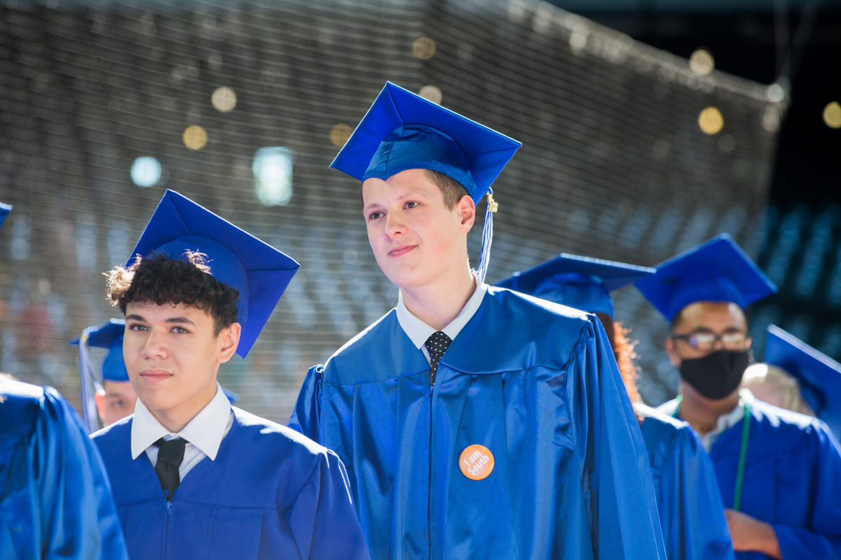 Student entering the stadium for the ceremony