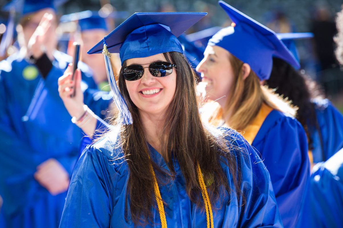 Student entering the stadium for the ceremony
