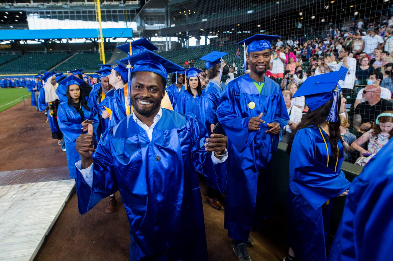 Student entering the stadium for the ceremony