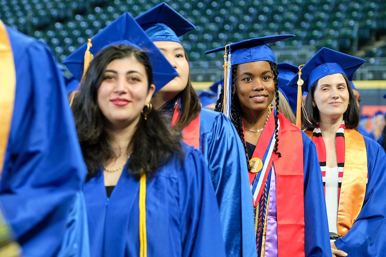 Students entering the stadium for the ceremony