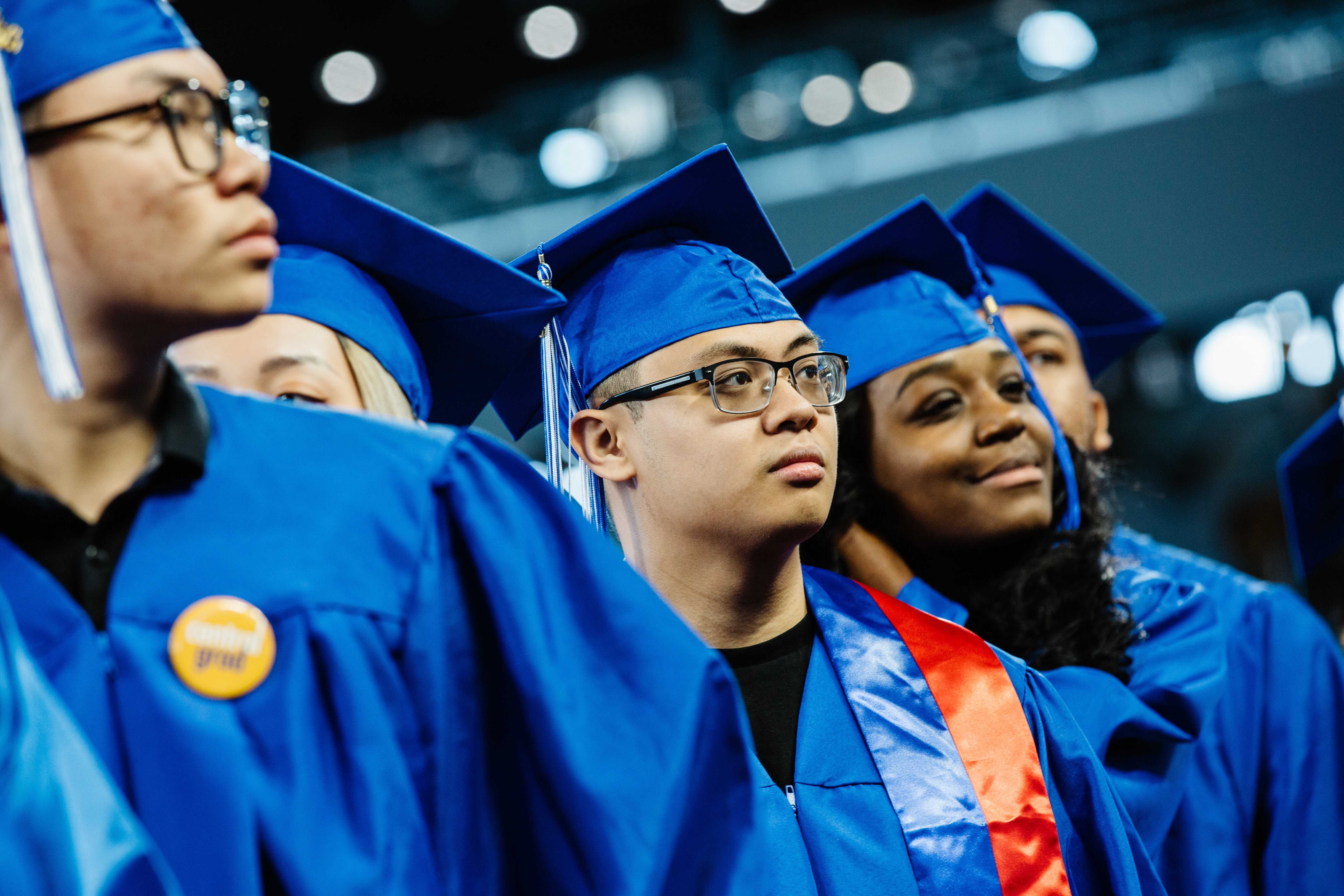 students entering the stadium for the ceremony