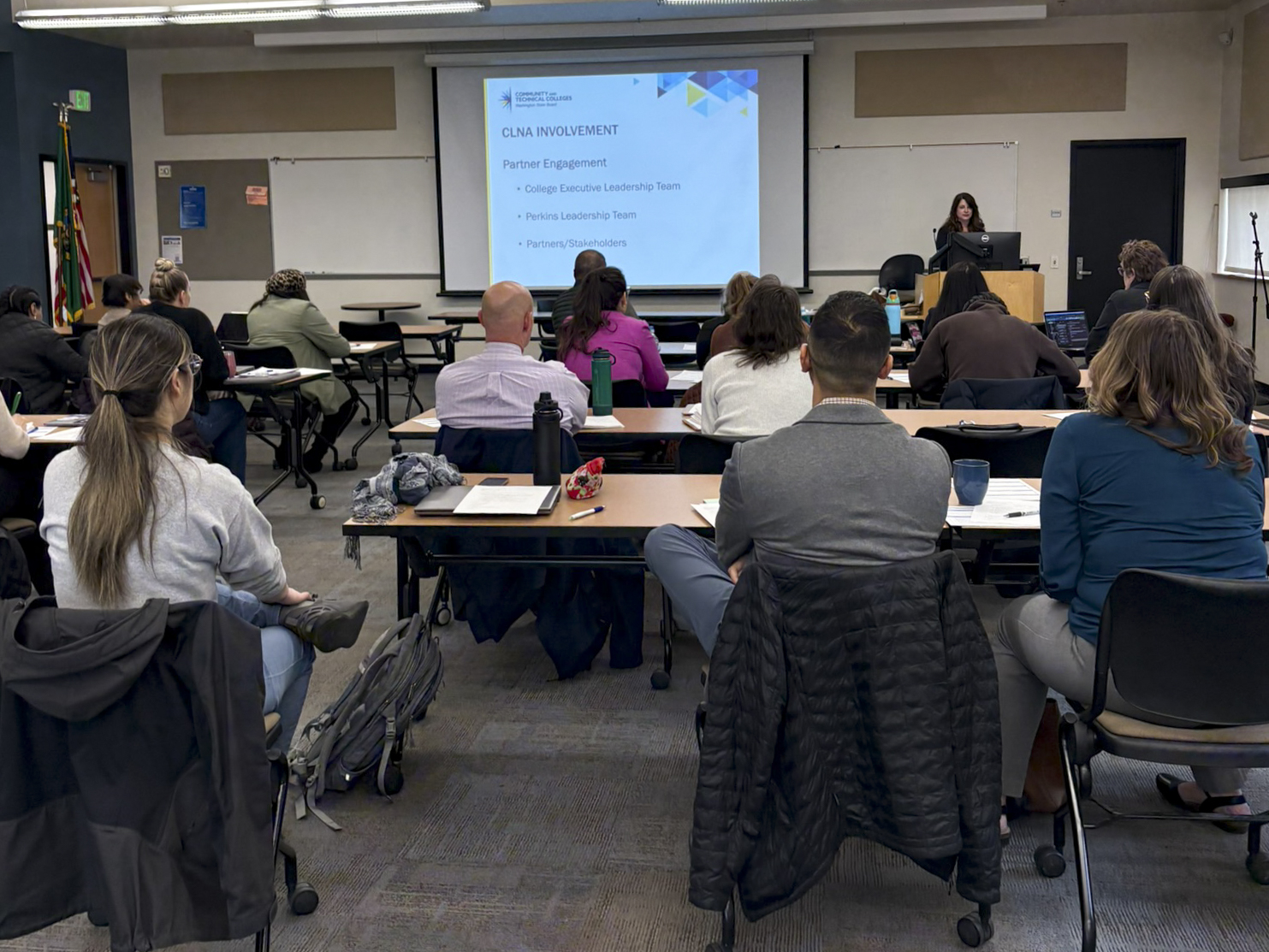 Speaker and attendees at 2025's first Deans' Council Meeting hosted at South Seattle College's Georgetown Campus.