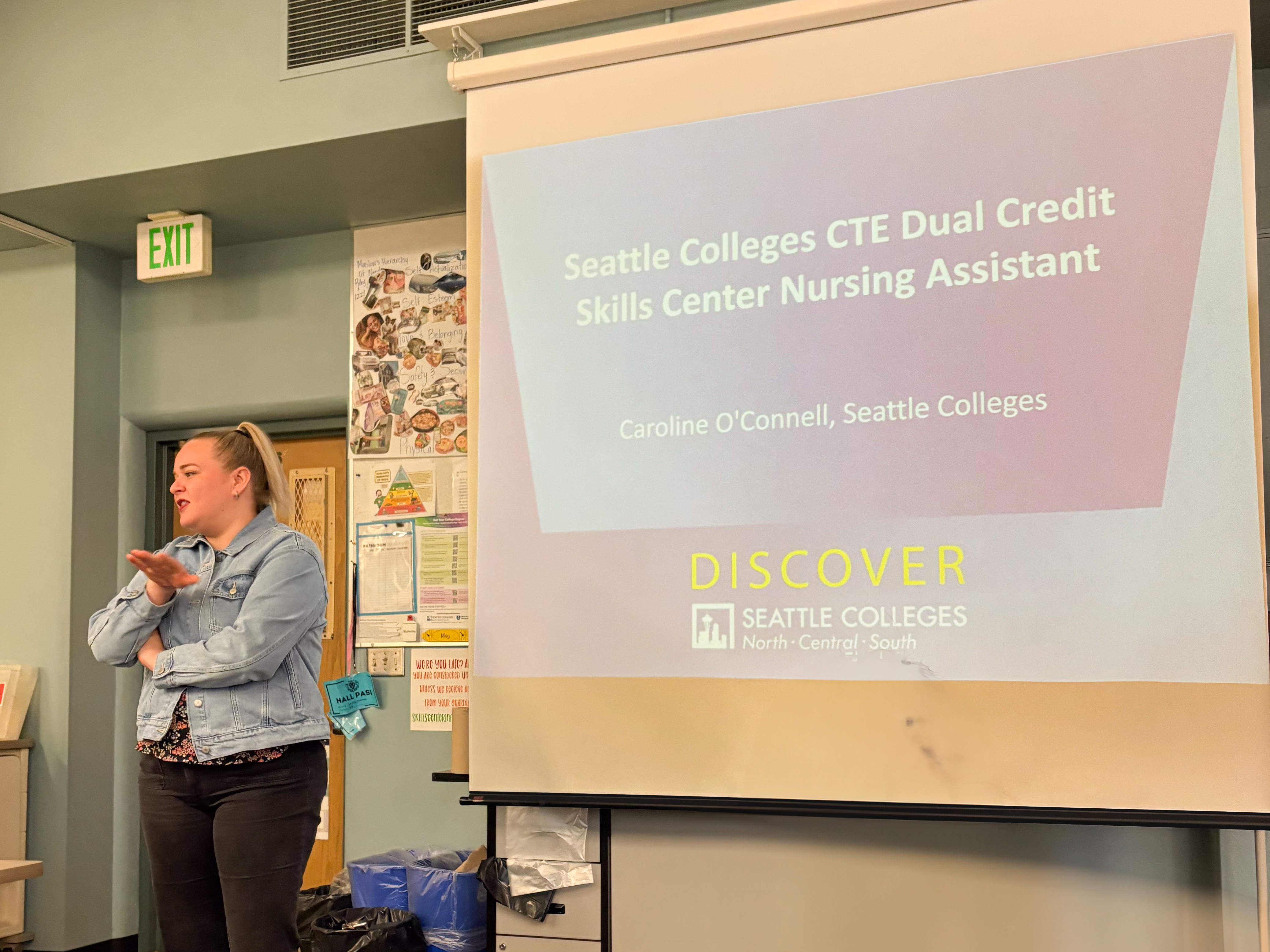 Caroline O'Connell, High School Initiatives Manager at Seattle Colleges District Workforce Development Office, giving a presentation on CTE Dual Credit for Nursing Assistants.