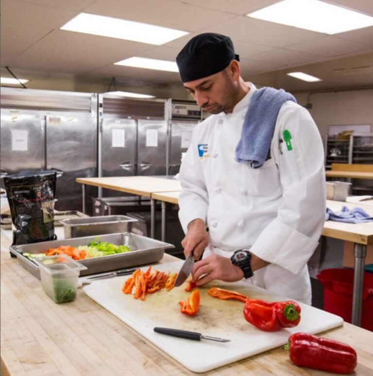 A culinary student preps food in South Seattle College newly renovated kitchen