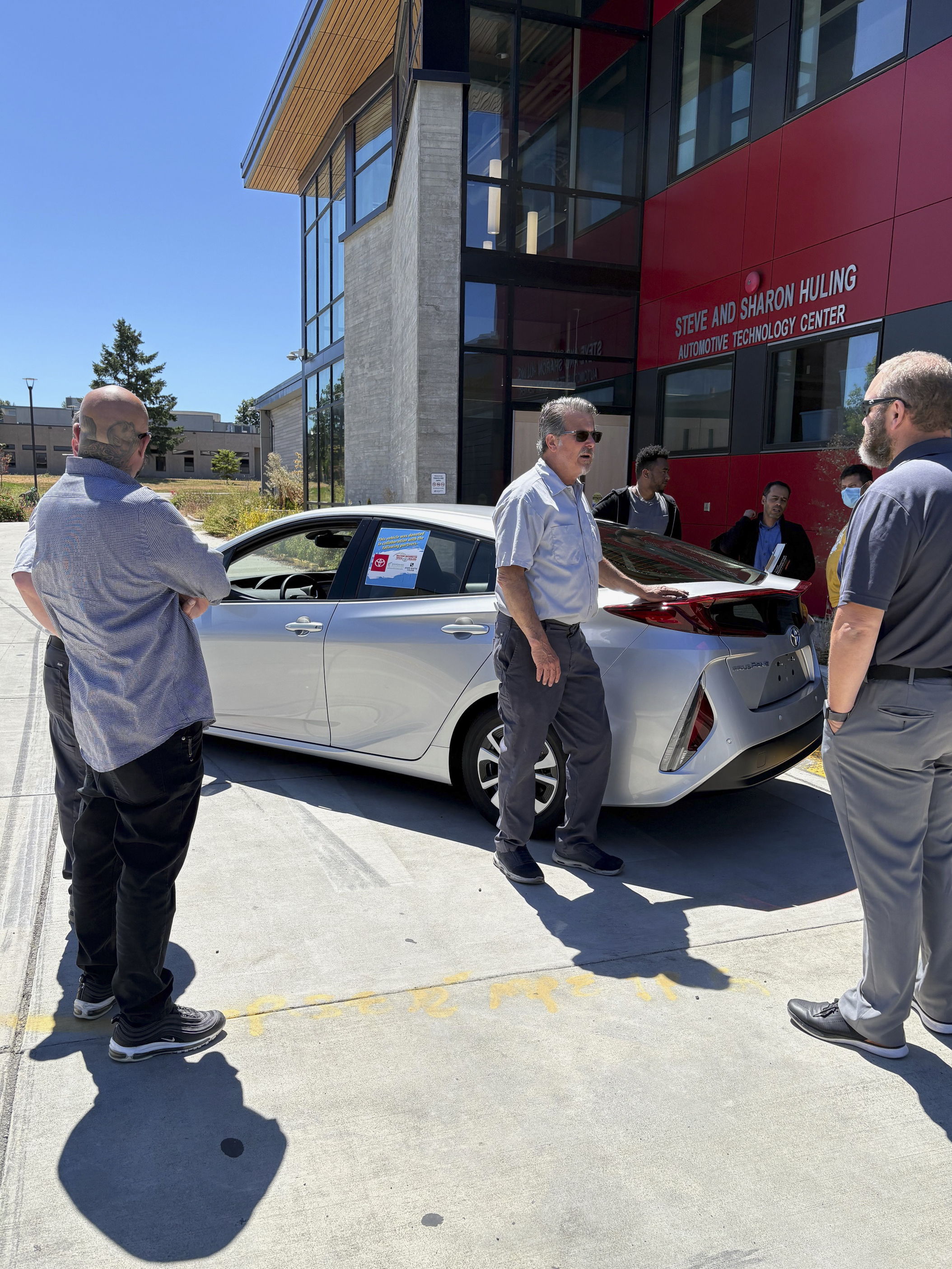 Seattle Colleges representatives (including Ferdinand Orbino, Dean of Instruction at South Seattle College), together with Toyota and Seattle Colleges representatives.