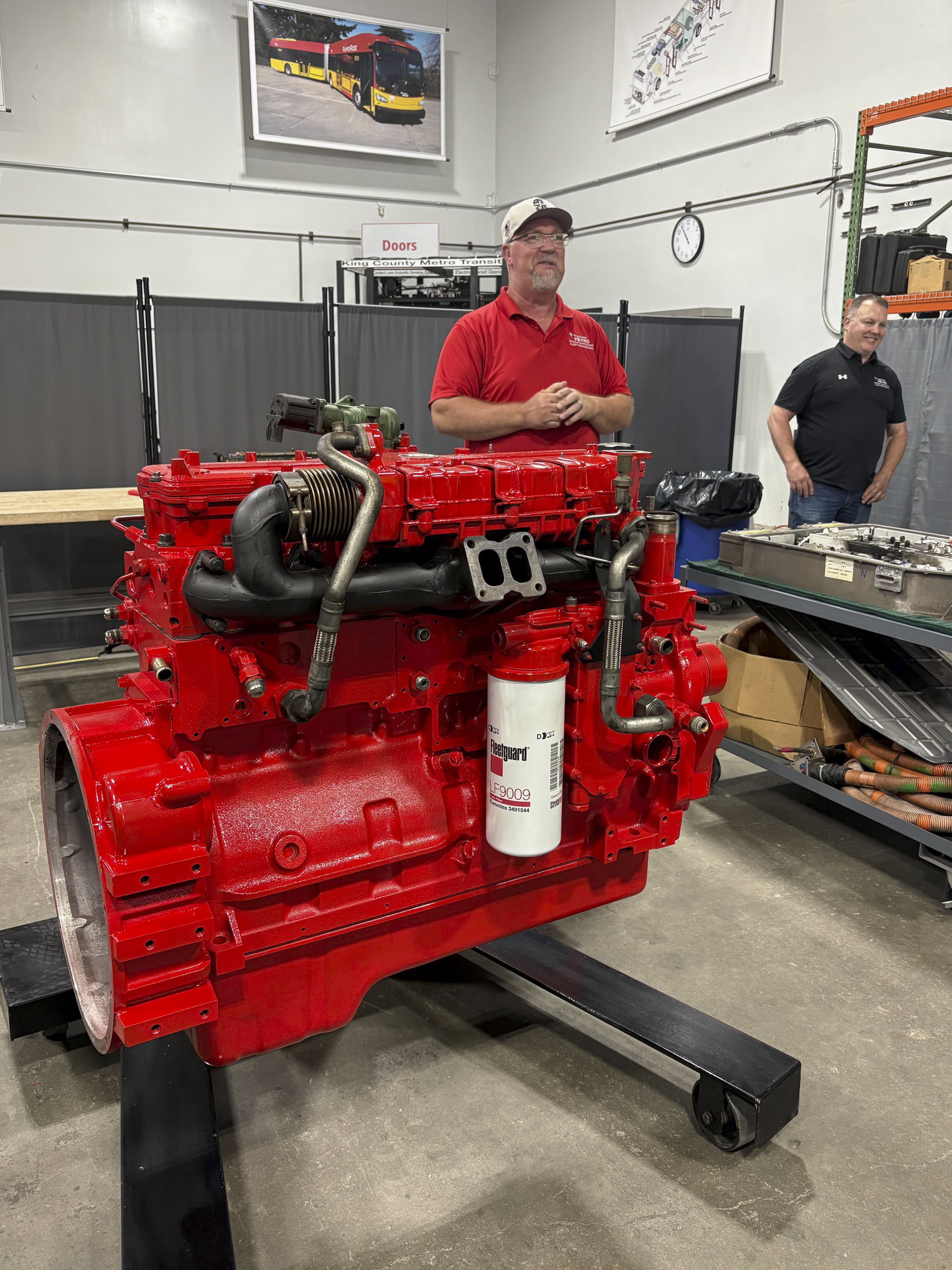 A view of an internal combustion engine during King County Metro facilities visit.