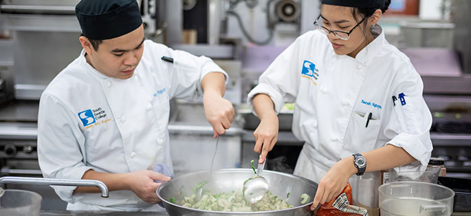 South Culinary students cooking together