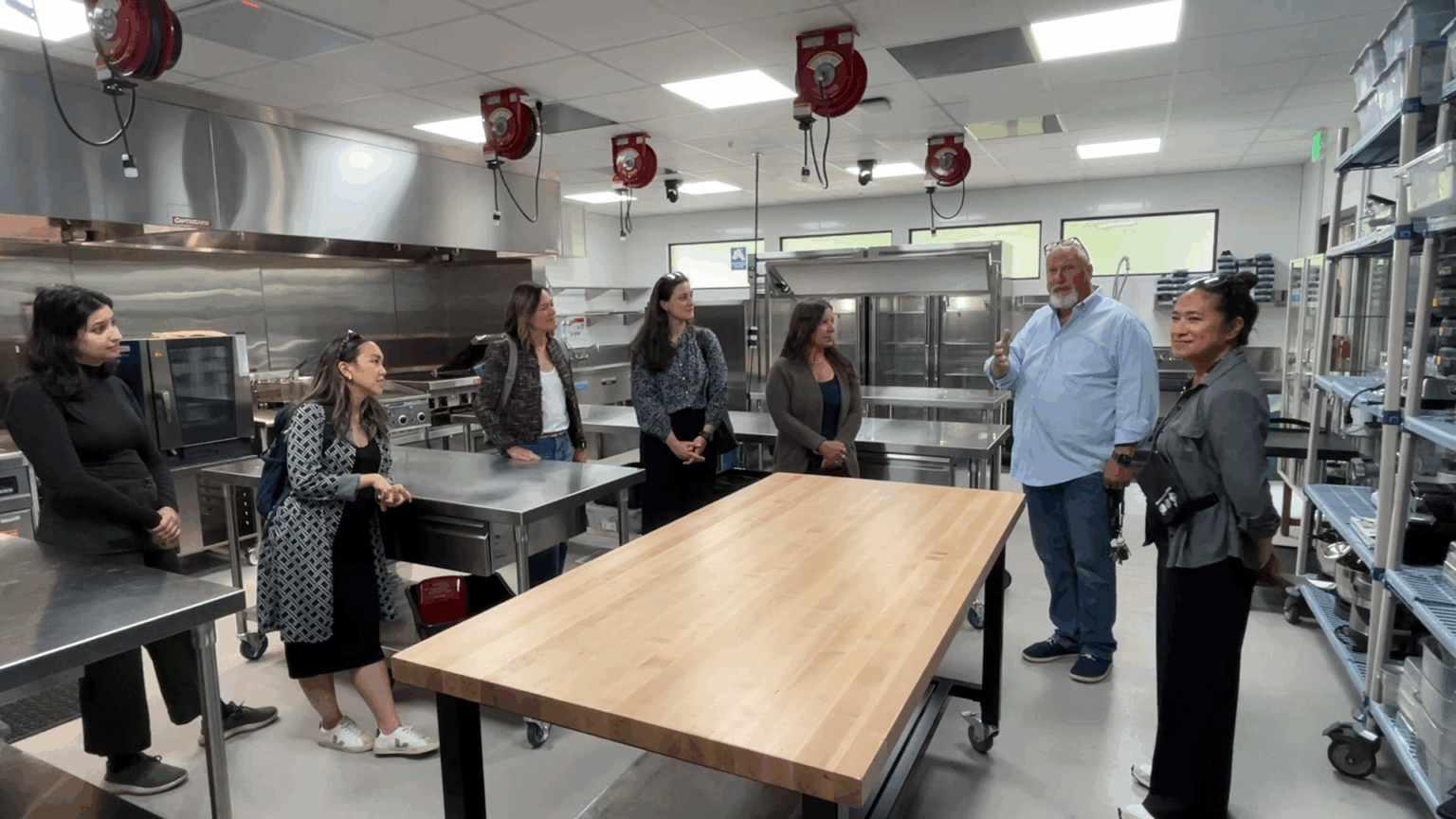South Seattle College’s culinary kitchen. Left to right: SEI Beacon fellow Katherine Wijenaike-Bogle; Commerce Deputy Assistant Director of Energy Cheryl Chan-Hardee; BEACON’s workforce program manager Isabel Baird; Commerce Energy Assistant Director Jennifer Grove; Commerce Buildings Unit Managing Director Emily Salzberg; South Seattle College Dean of Hospitality Brian Scheehser; South Seattle College Grant Director Sarah Sabay.
