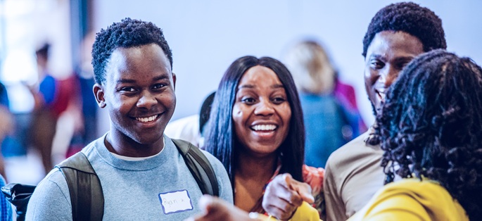 Smiling students at a campus event