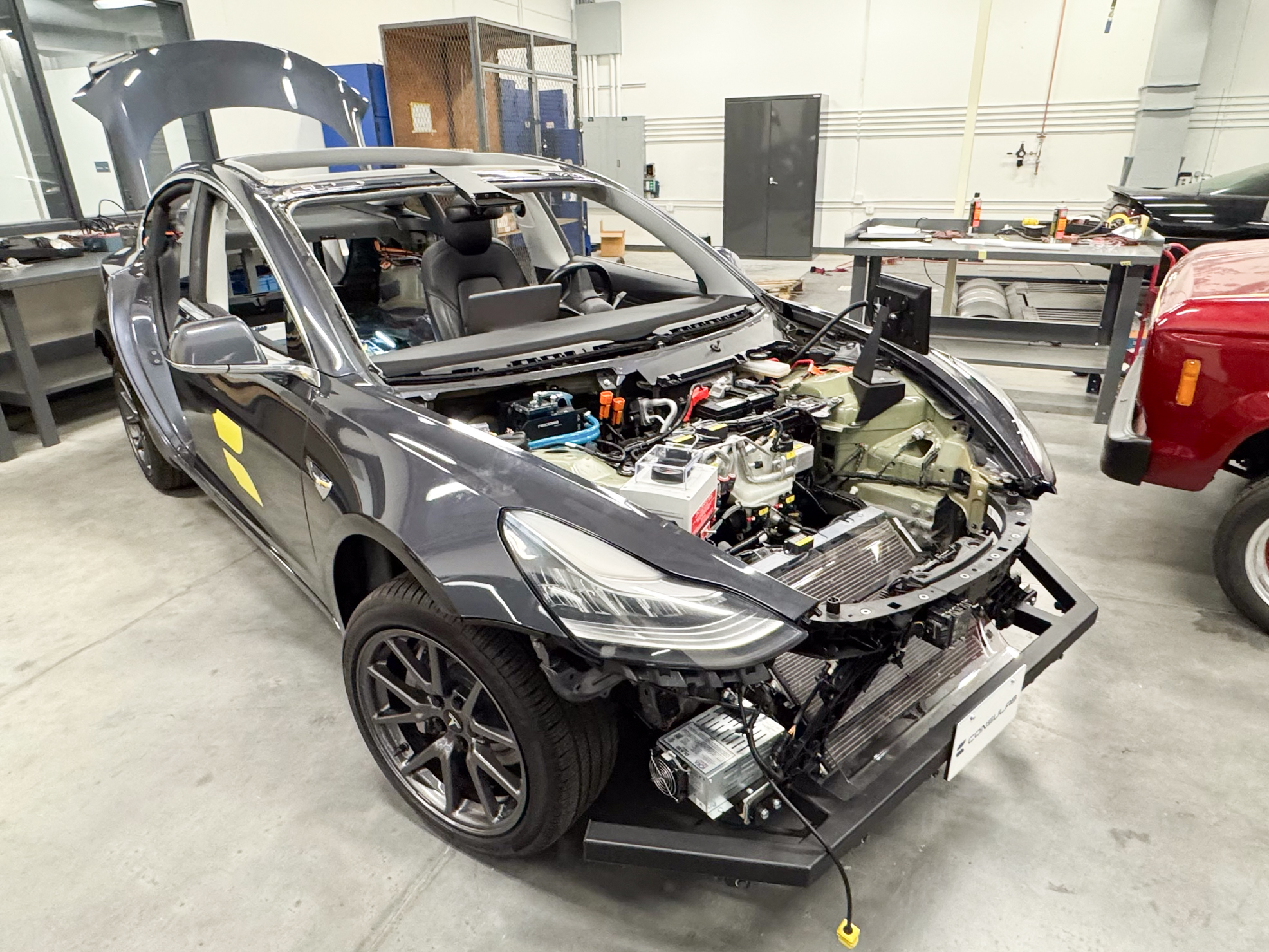 The newly acquired Consulab EV trainer, modified from a Tesla Model 3