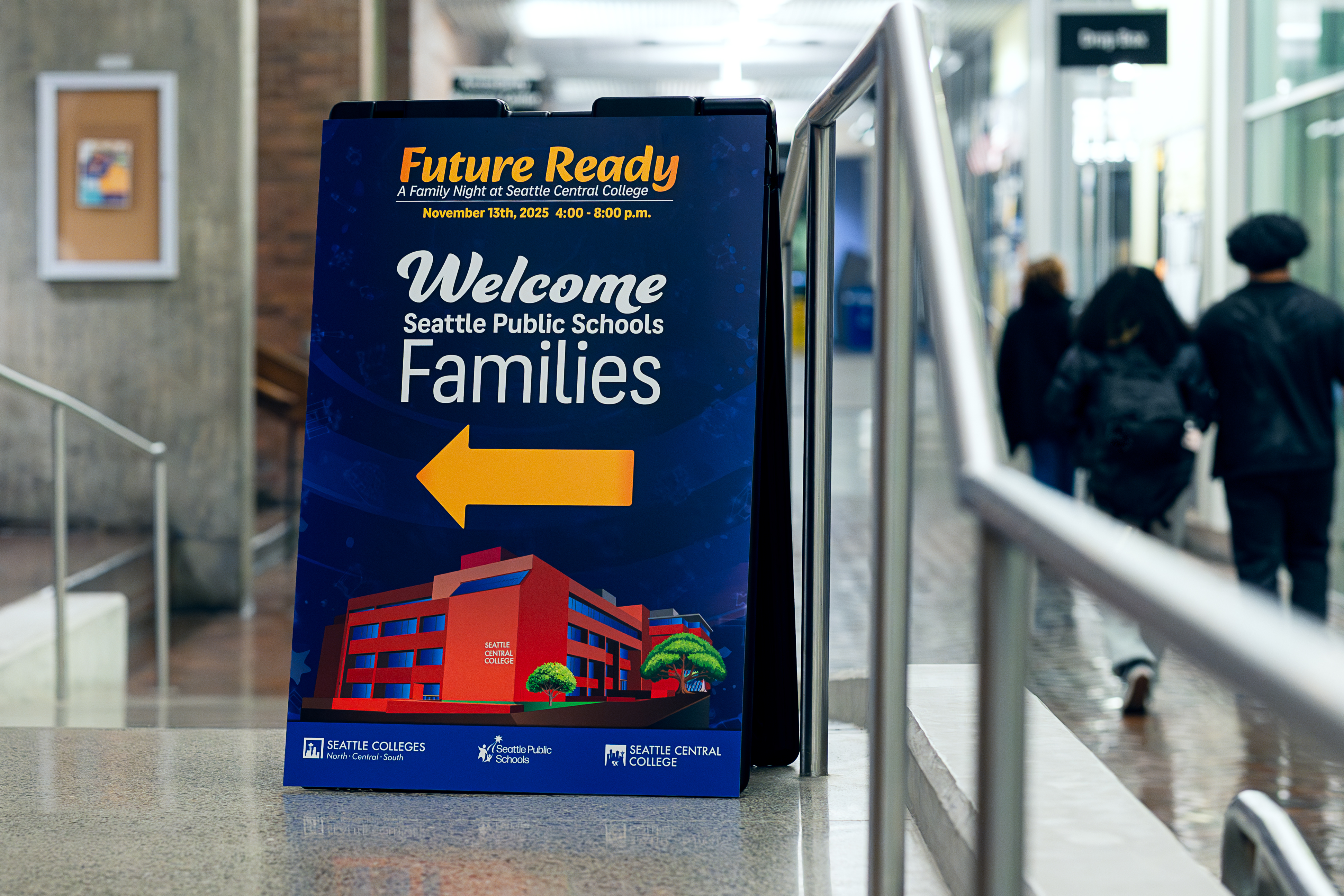 Sign directing attendees to the event that says “Welcome Seattle Public Schools Families”