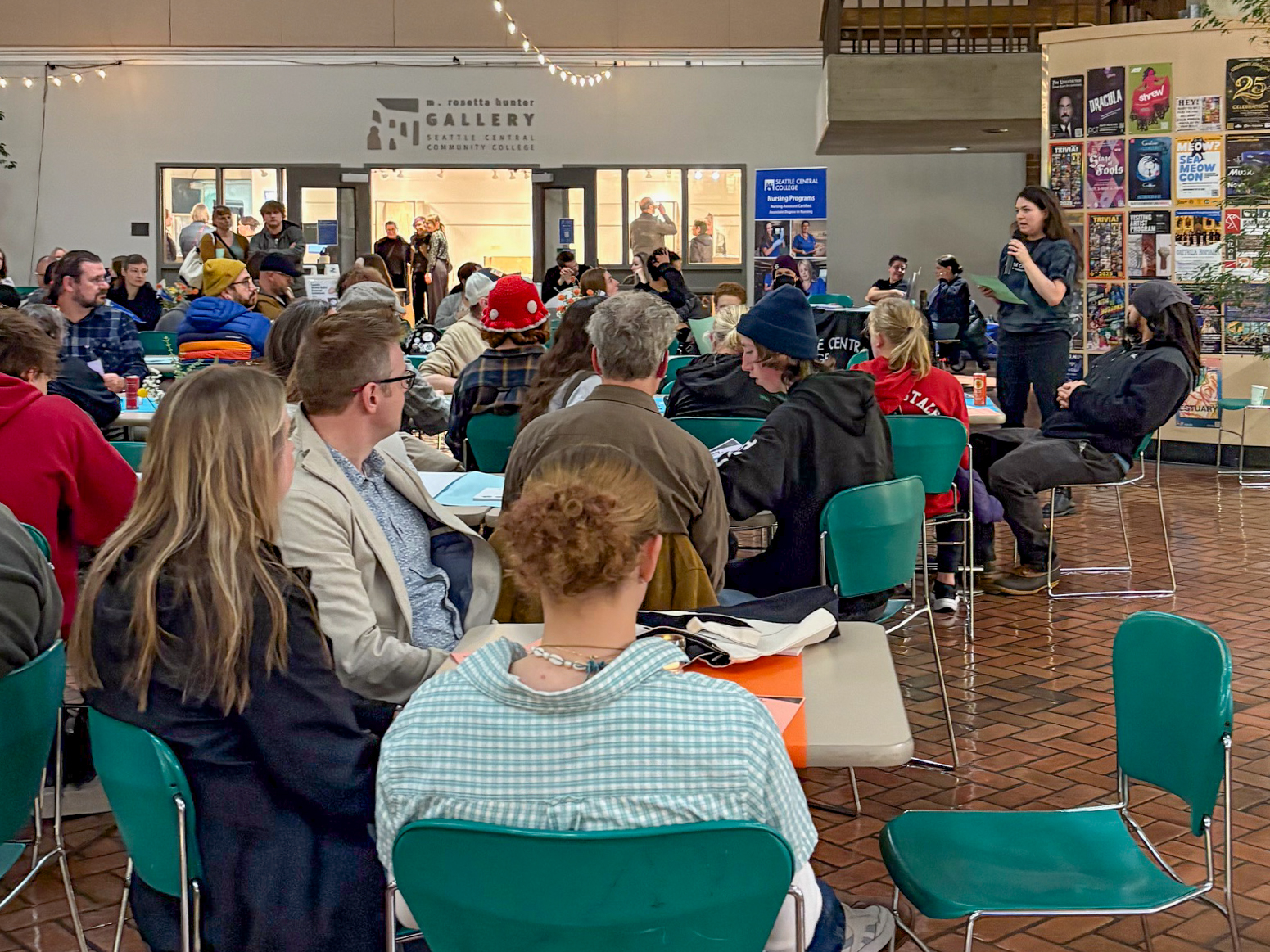 Rachel Andre speaks to the 100+ attendees at Seattle Central College family night