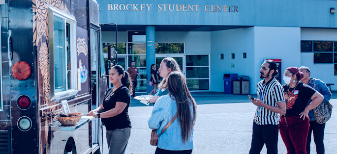employees in line at the ice cream truck outside Brockey Student Center at South Seattle College