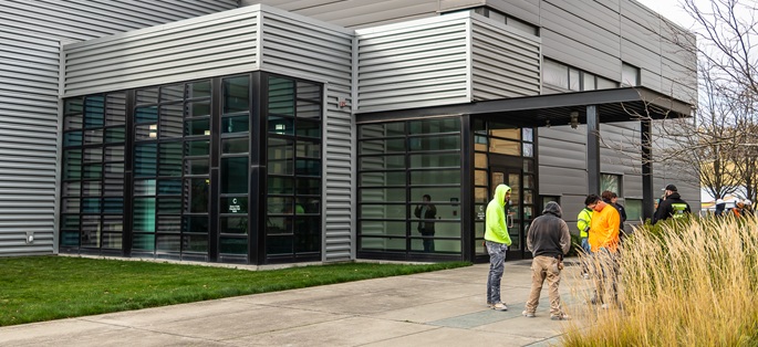 students outside the main building at South Seattle College's Georgetown Campus 