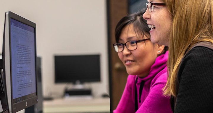 women at a computer screen