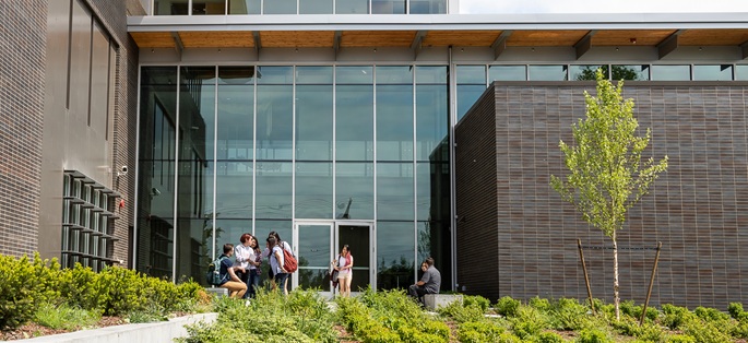 Students outside a building on the campus of South Seattle College