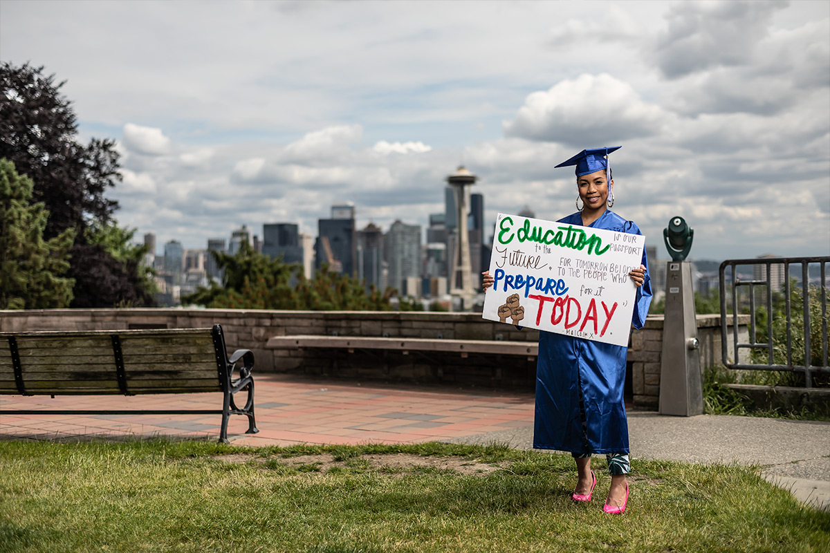 2020 grad with city in background