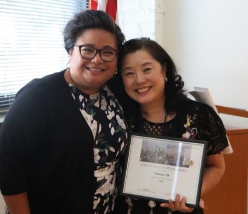 Left to right: Interim Chancellor Rosie Rimando-Chareunsap, Young Lim