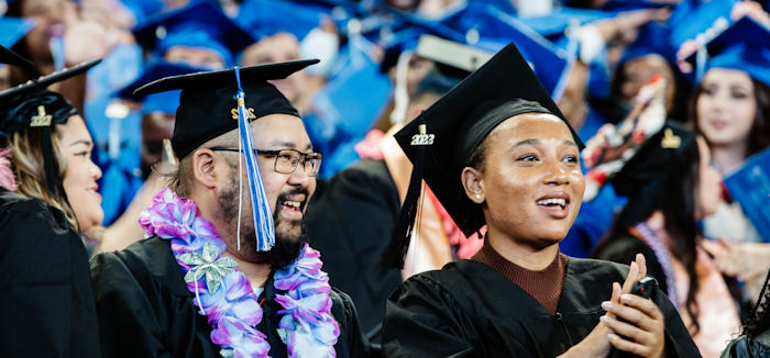 students in caps and gowns at the commencement ceremony