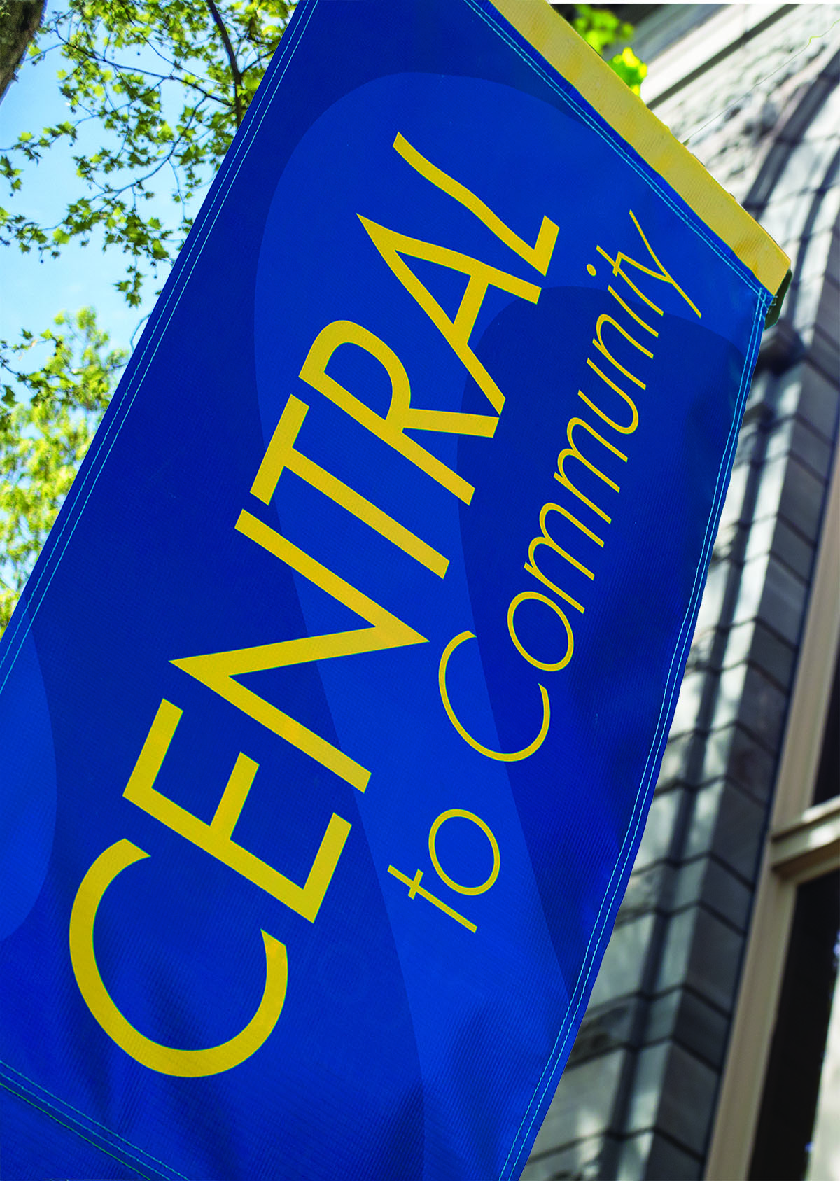 Central to the Community banner