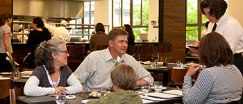 family at table at One World Restaurant